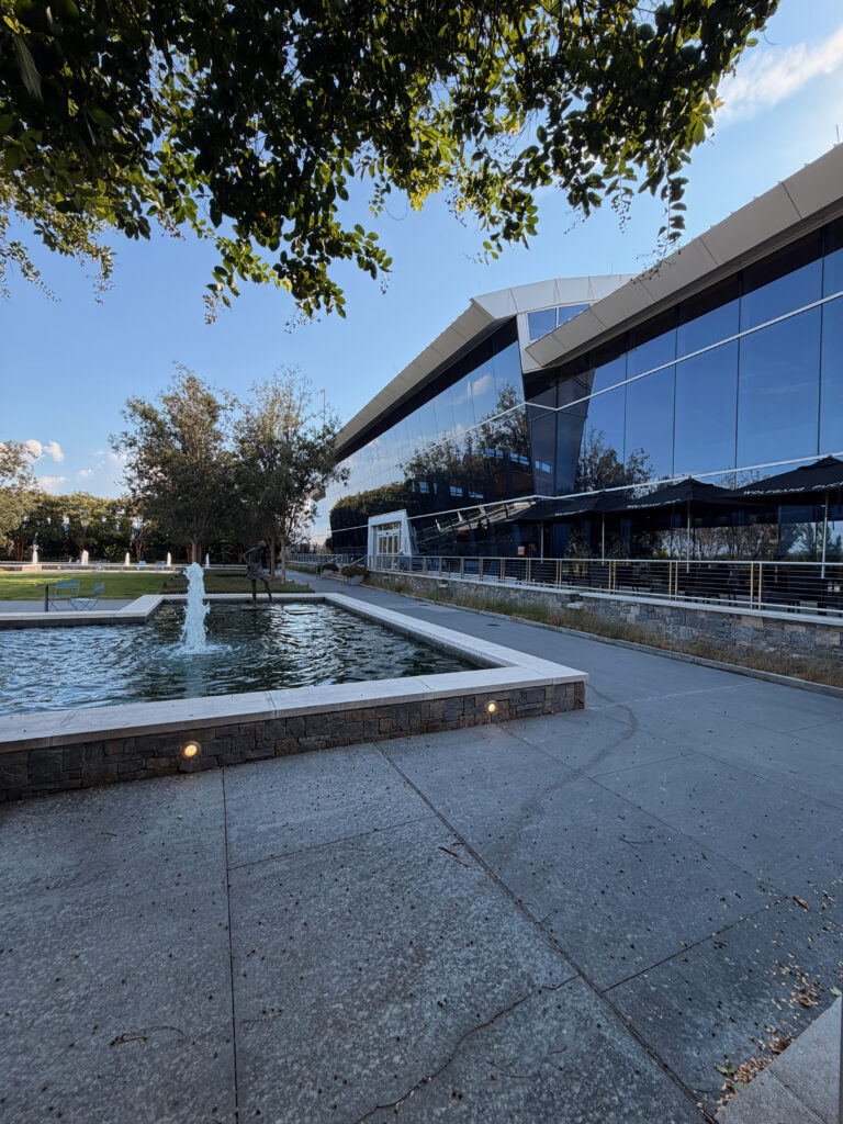 Outside view of the water feature with statues playing in the water