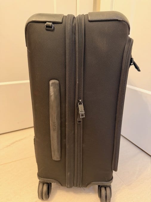 Side view of carry on suitcase from Tumi