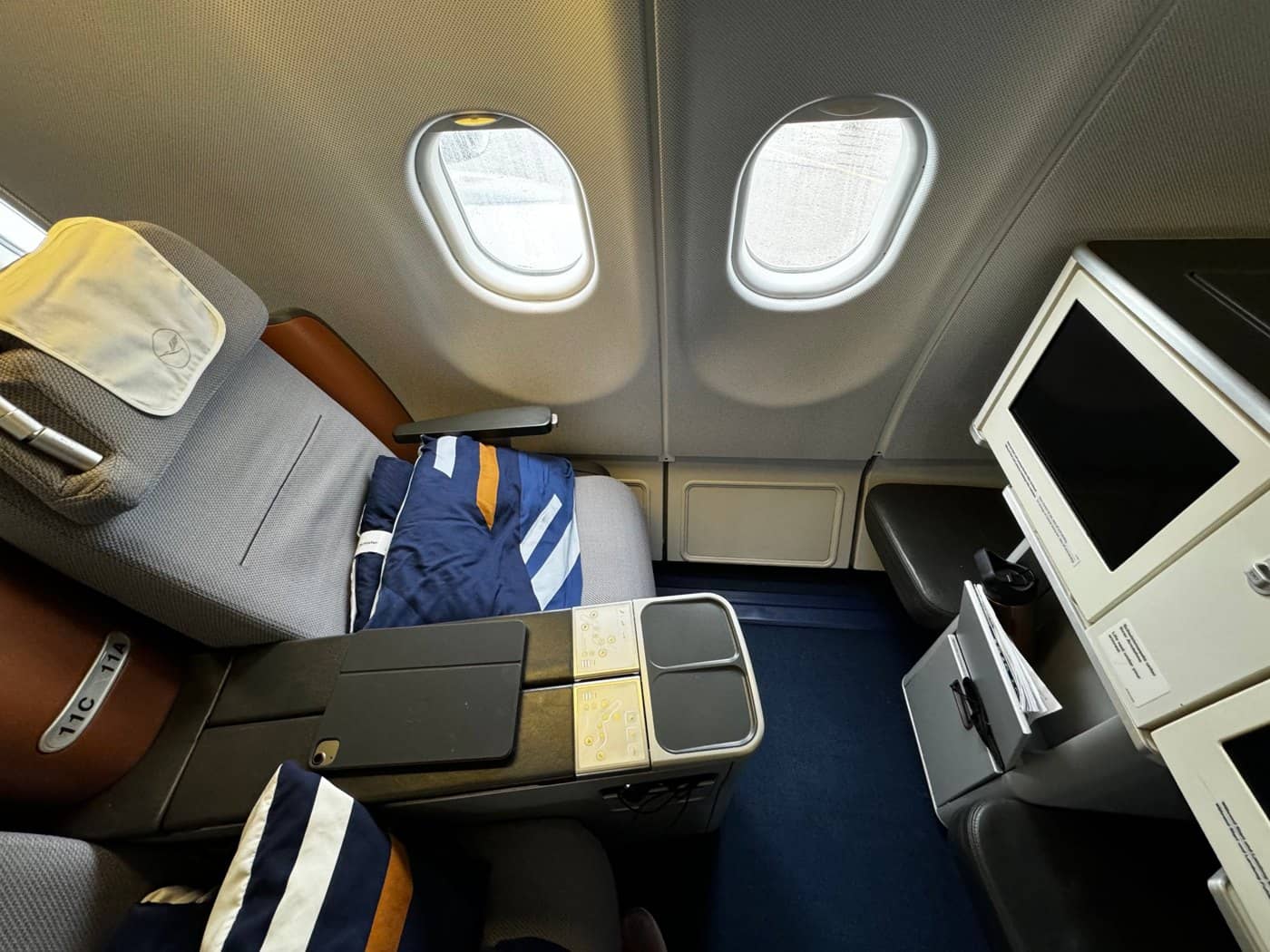How to Stay Hydrated on Long Haul Flights 2026 Long haul window seat in Lufthansa A340 business class