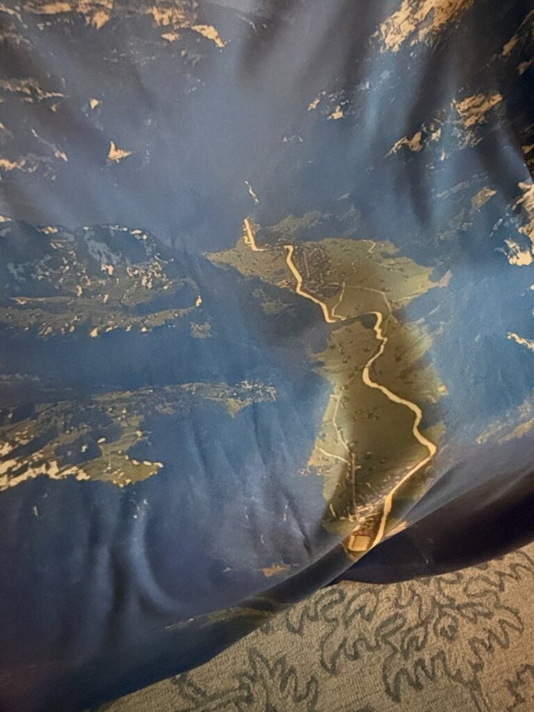 Close-up of the Swiss Alps valley and river printed on the blanket