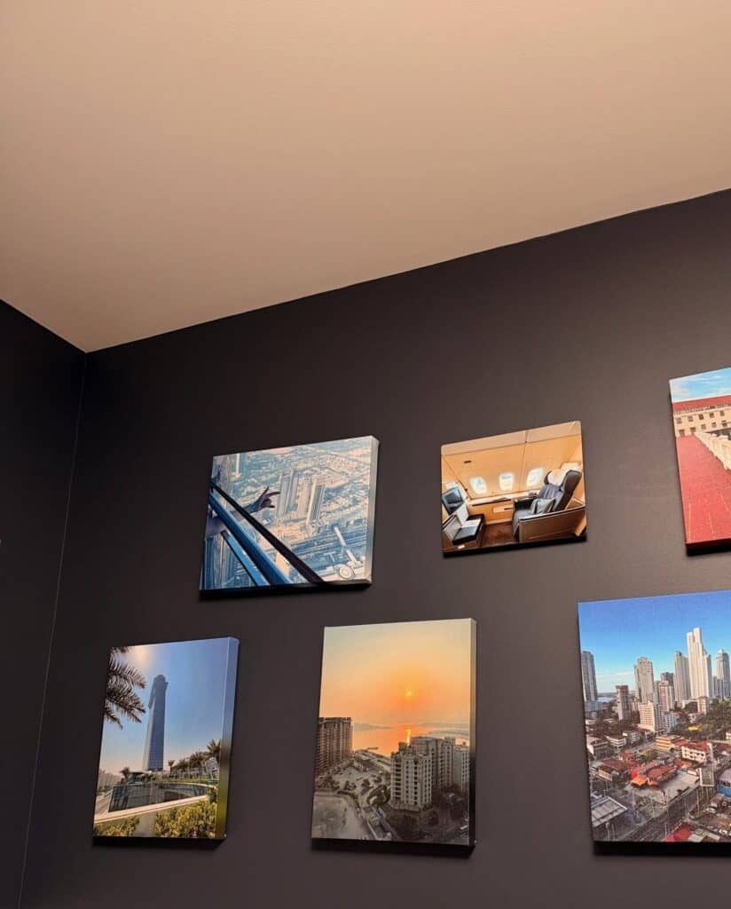 Canvas prints of Dubai, a first class cabin and city skylines on a dark office wall